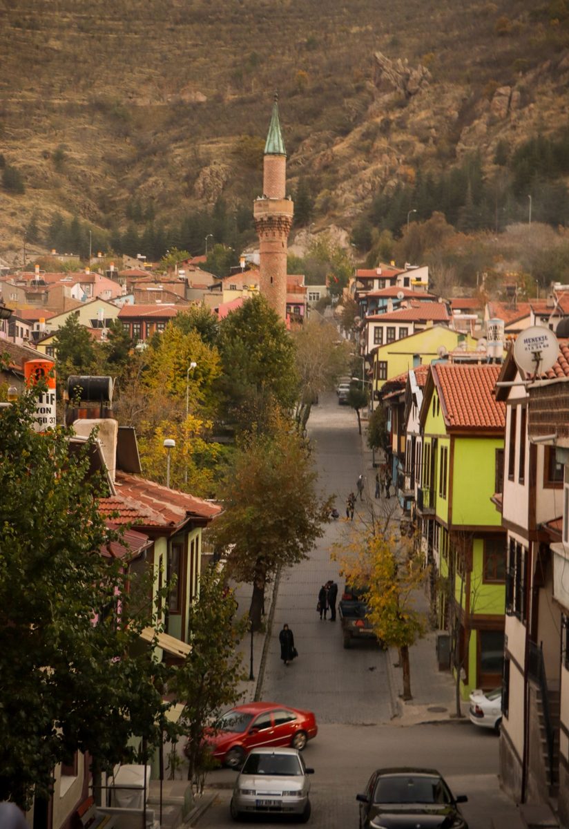 Streets of Afyonkarahisar with a historic minaret