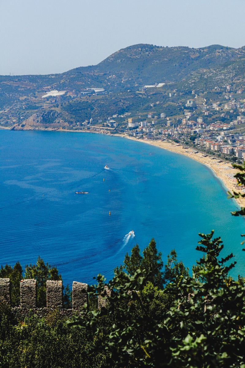Summer view of the Alanya coastline, beach and castle