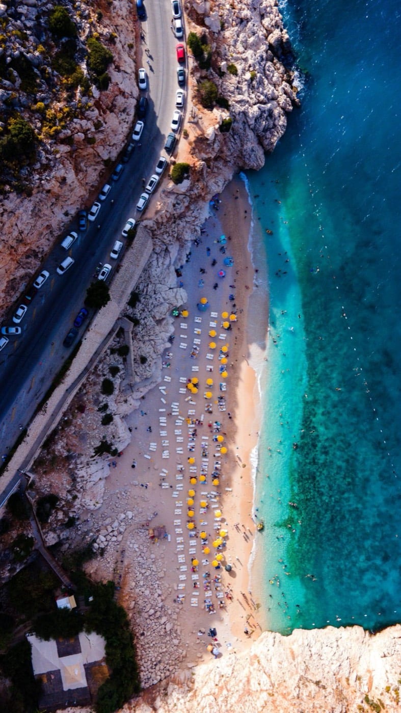 Aerial view of Kaputaş Beach near Kaş - turquoise water and narrow sandy cove between cliffs