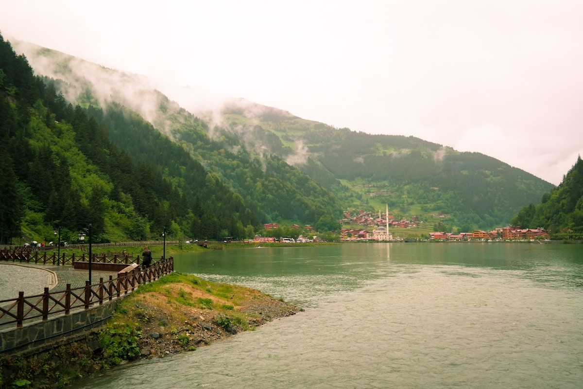 Uzungöl lake surrounded by misty forested mountains in the Black Sea region of Turkey