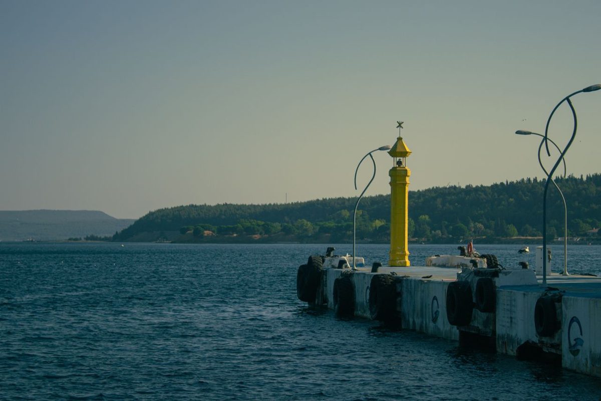 Canakkale harbour pier beside the lighthouse at dusk