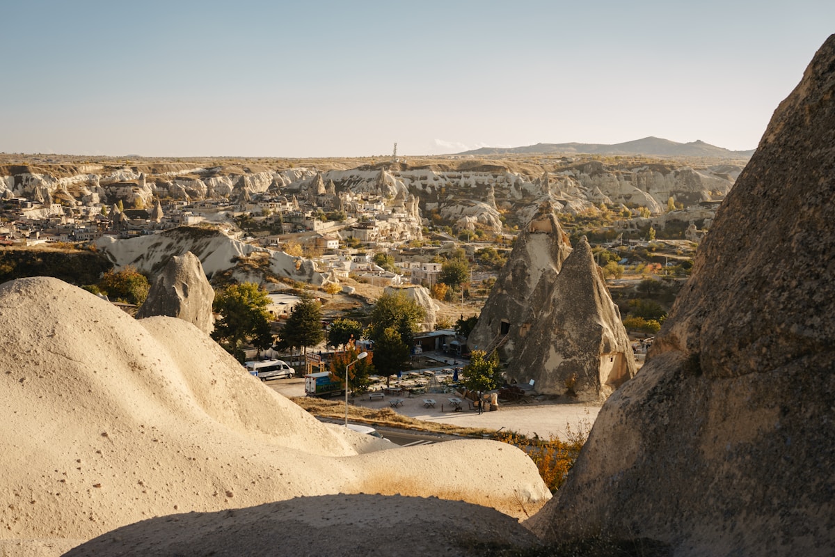 Göreme village with fairy chimney rocks and stone buildings, Cappadocia, Turkey