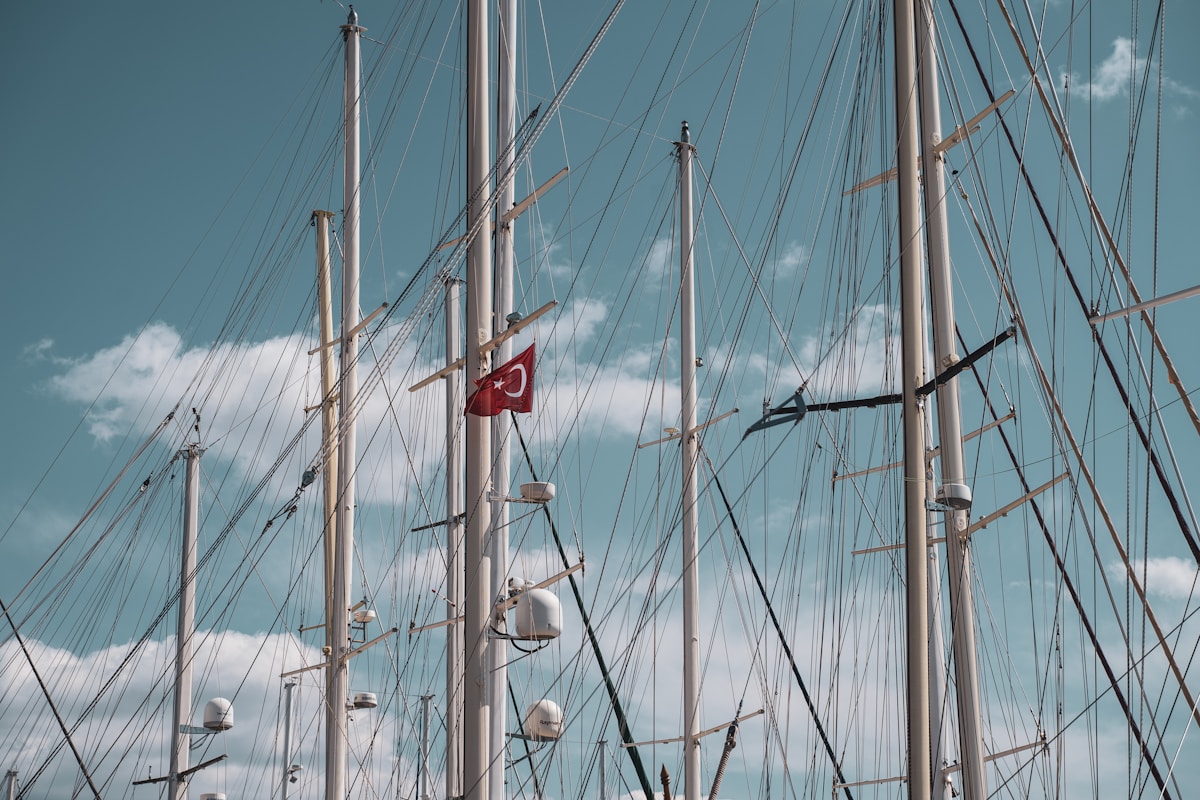Sailboat masts with Turkish flag in a marina on the Aegean coast of Turkey