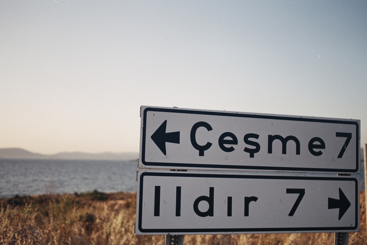 Road sign pointing to Çeşme on the Aegean coast of Turkey, 7 km ahead