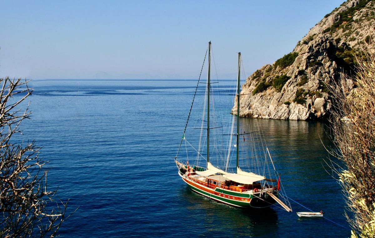 Sailboat anchored in the waters of Datca Bay