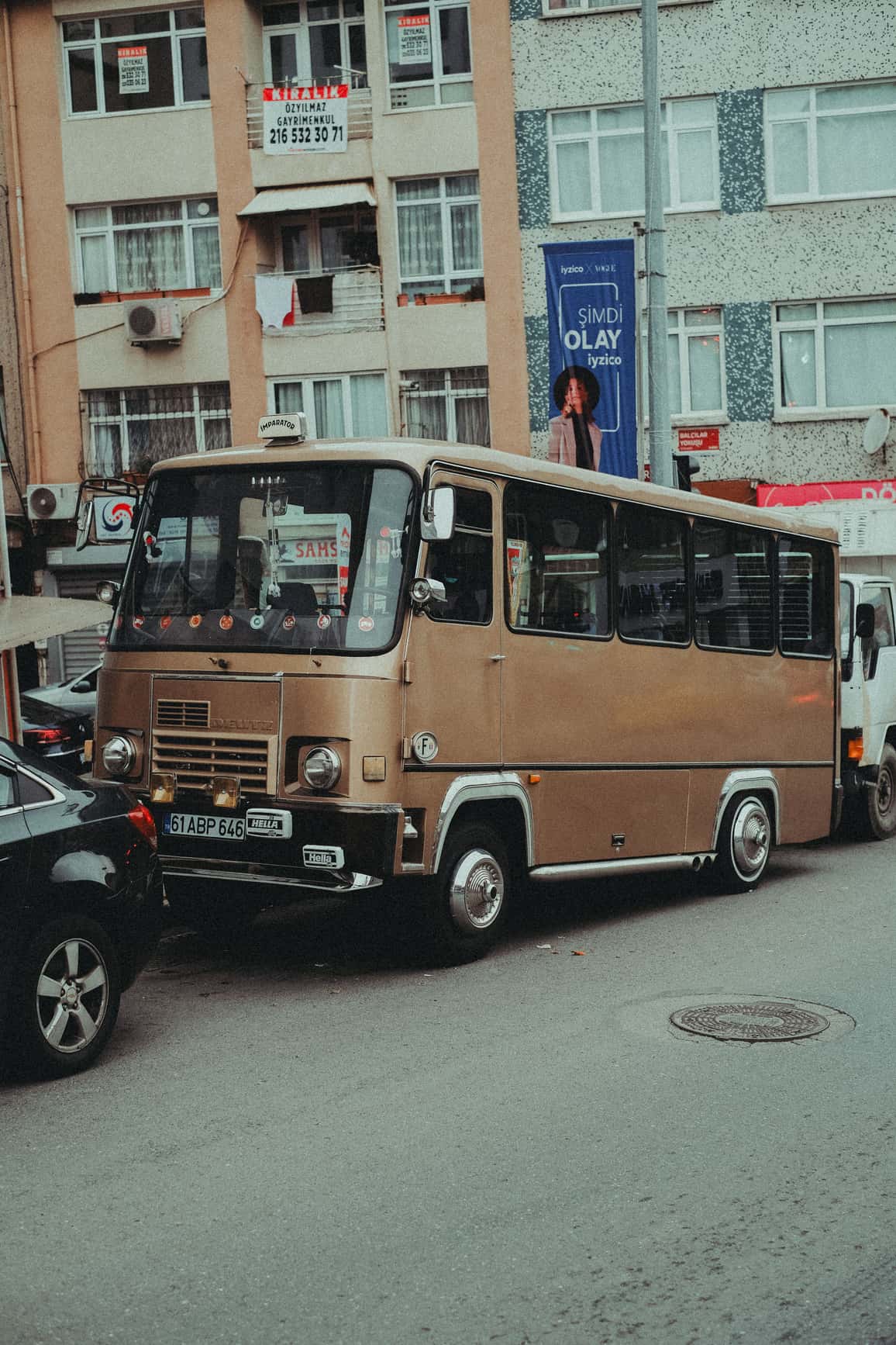 Vintage dolmuş minibus on a busy city street in Turkey