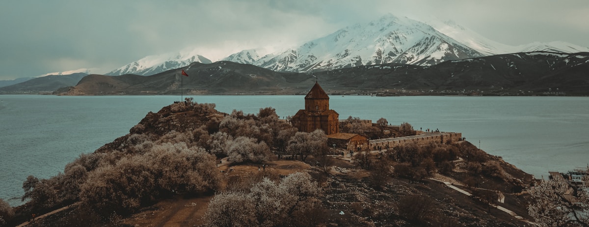 Akdamar Island Church on Lake Van with snow-capped mountains, eastern Turkey