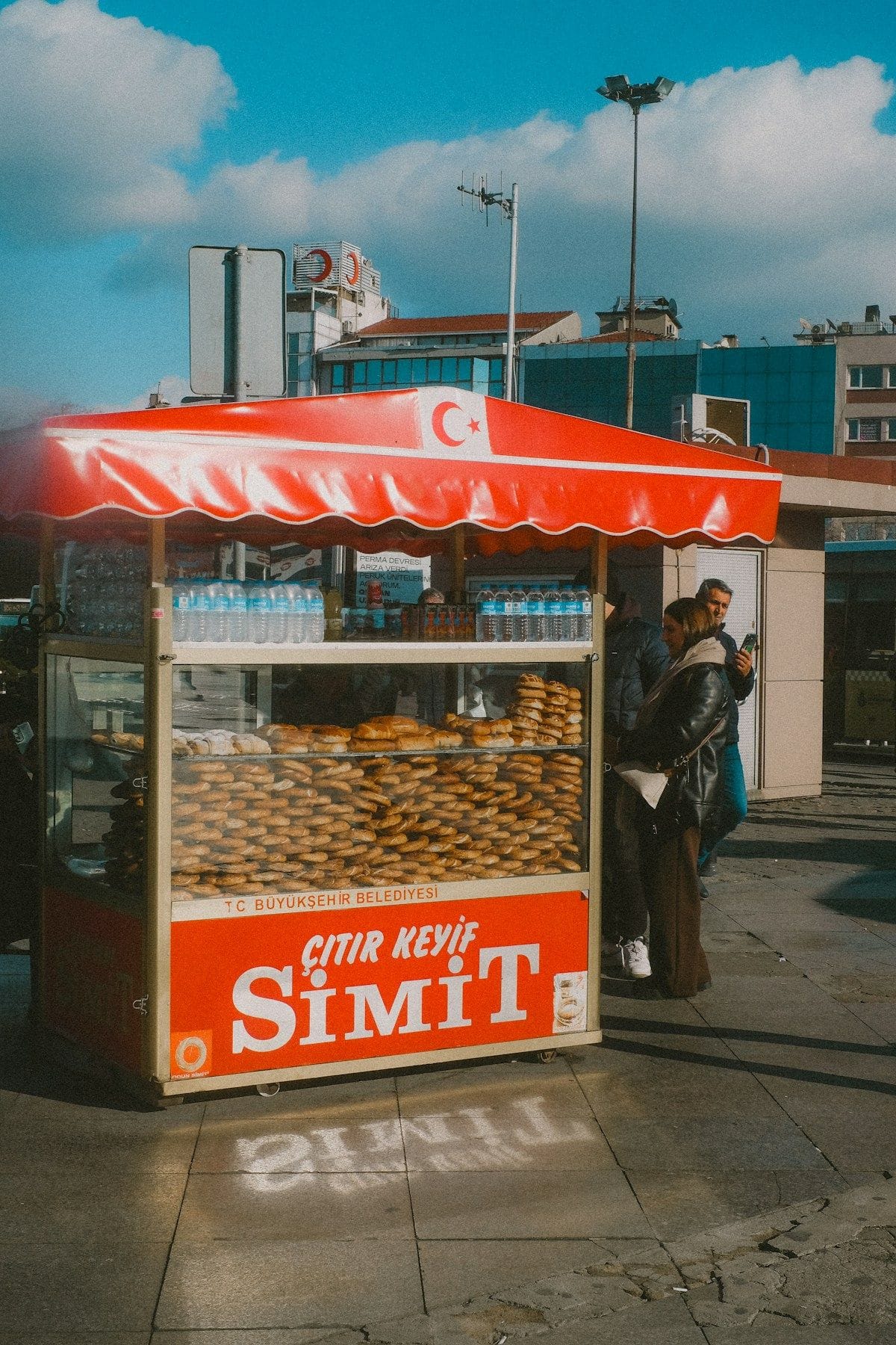 Red simit street cart with Turkish flag in Istanbul city street