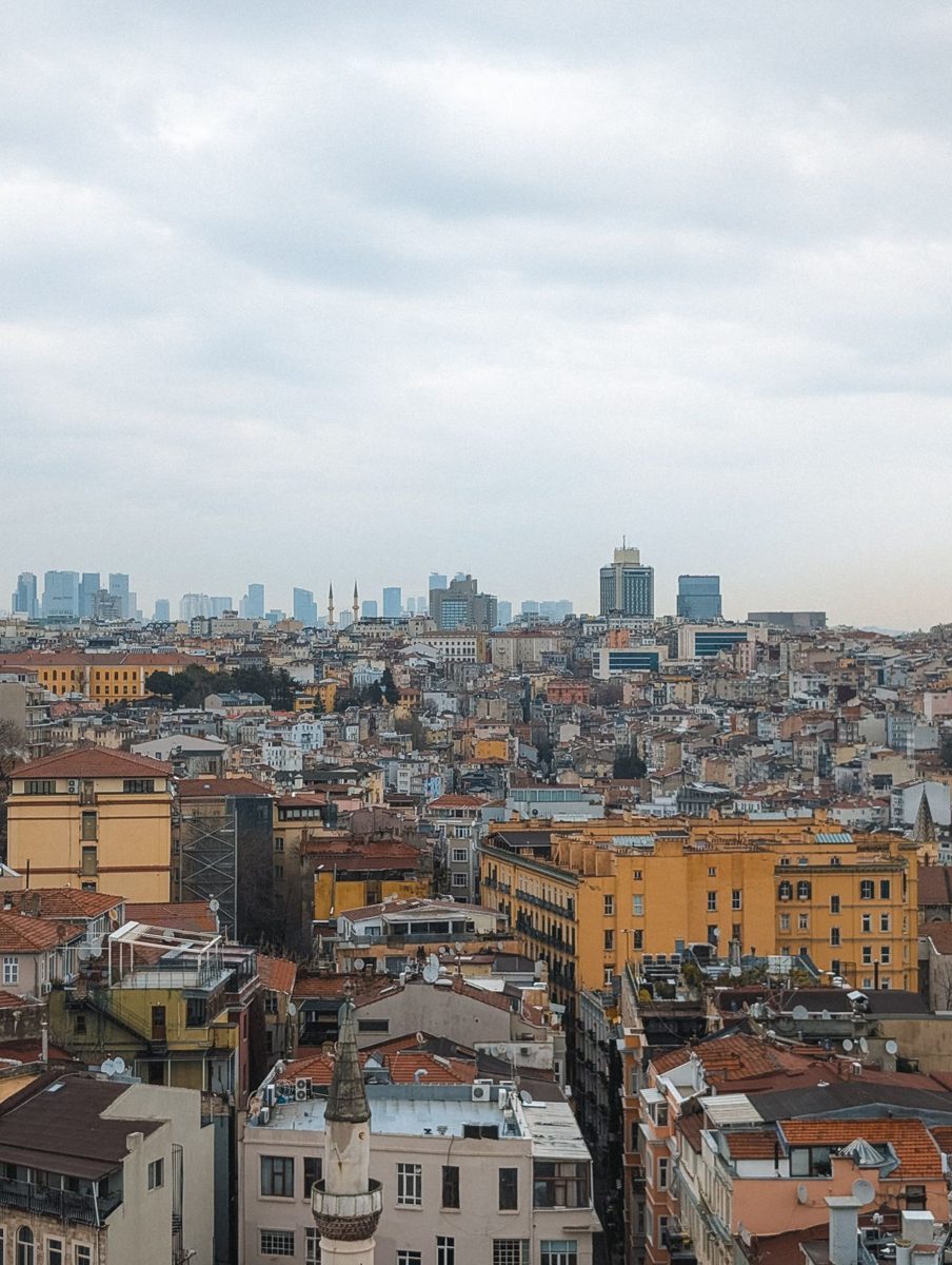 Istanbul's historic and modern architecture under a cloudy sky