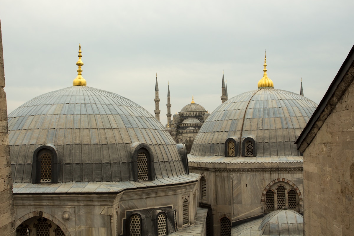 Hagia Sophia domes with the Blue Mosque visible in the background — the Sultanahmet historic district, Istanbul