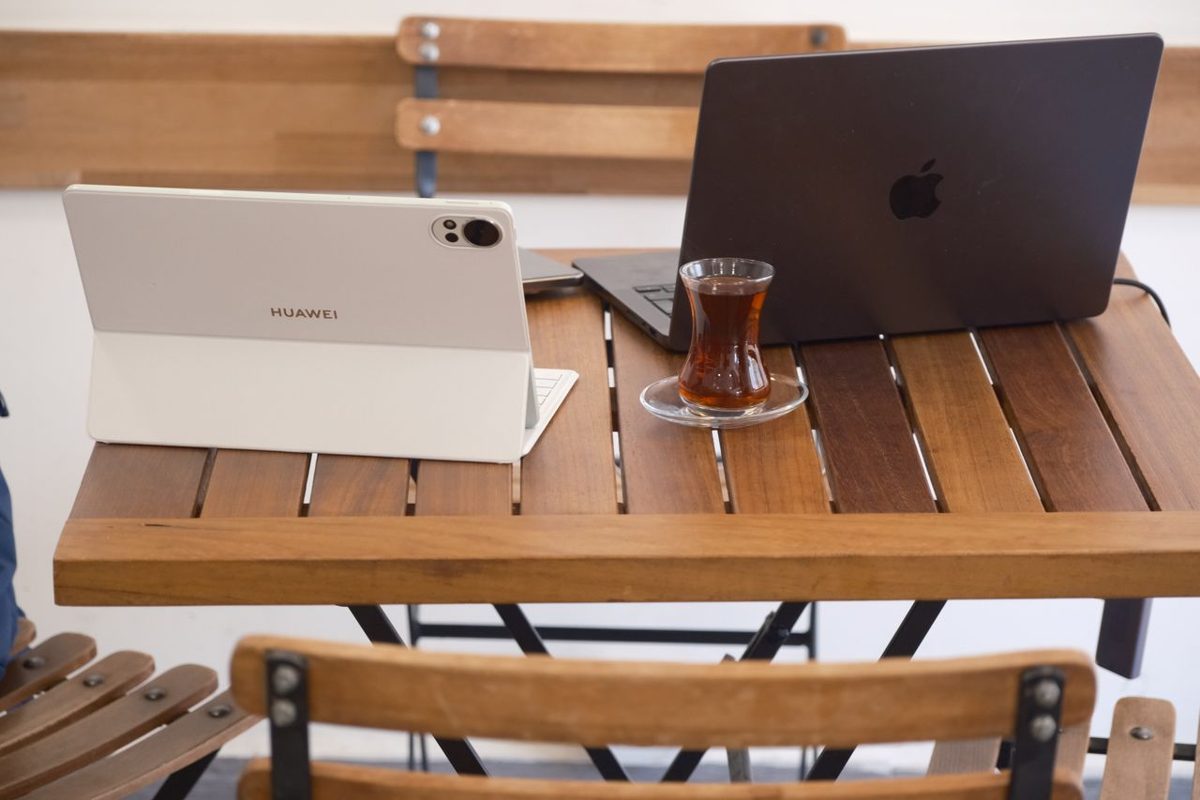 Cafe workspace with a laptop and tea in Izmir