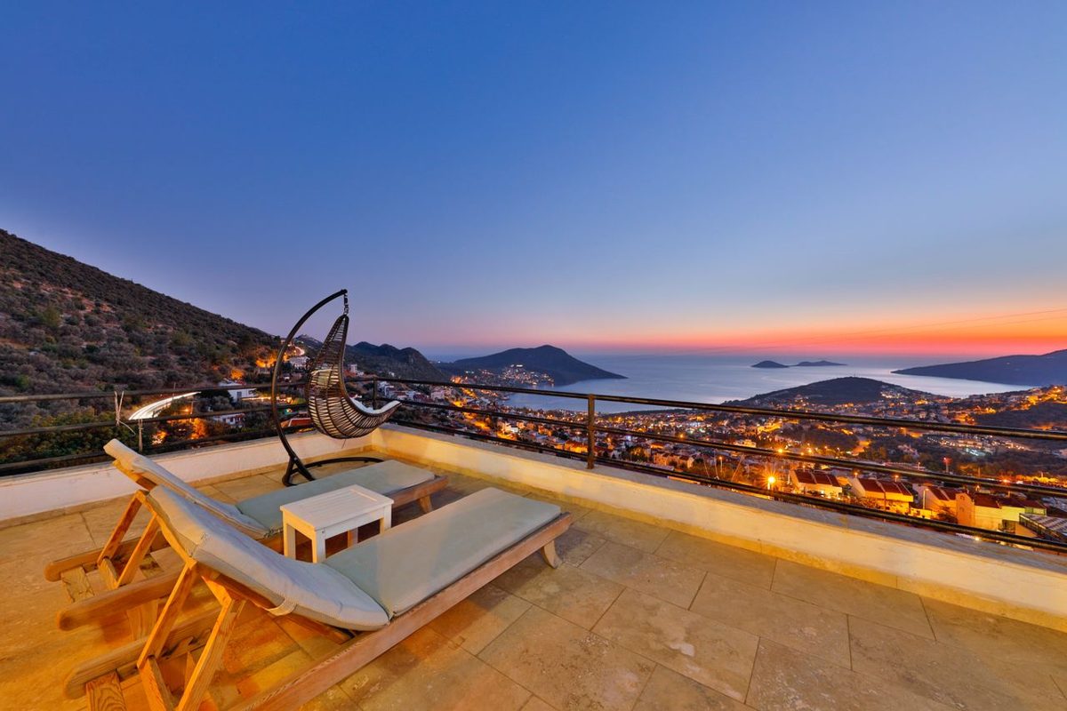 Terrace with deckchairs looking over the Mediterranean and islands near Kalkan