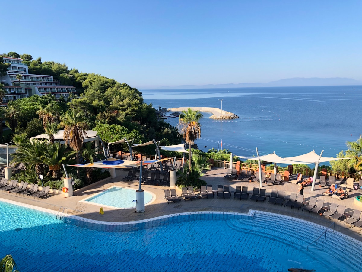Swimming pool at a Turkish resort overlooking the Aegean sea - Fethiye region, Turkey