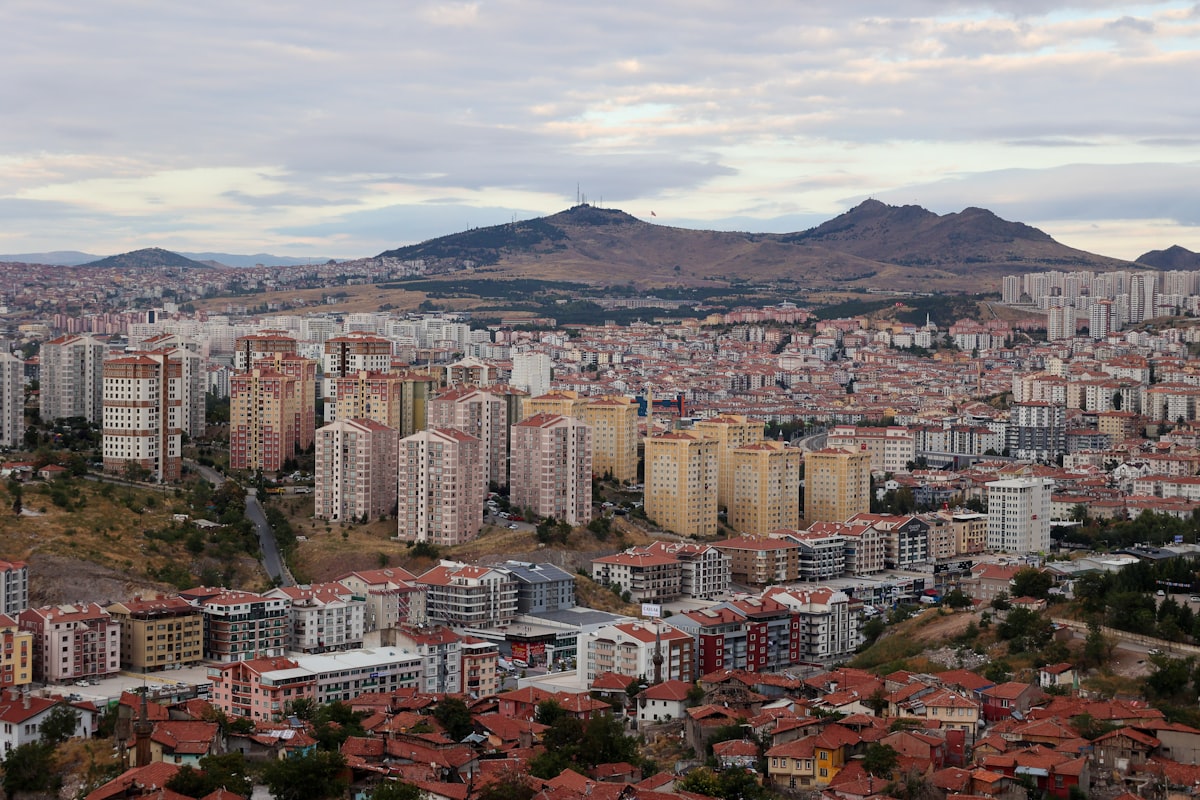 Aerial view of Ankara city with residential districts and mountains rising behind the Turkish capital
