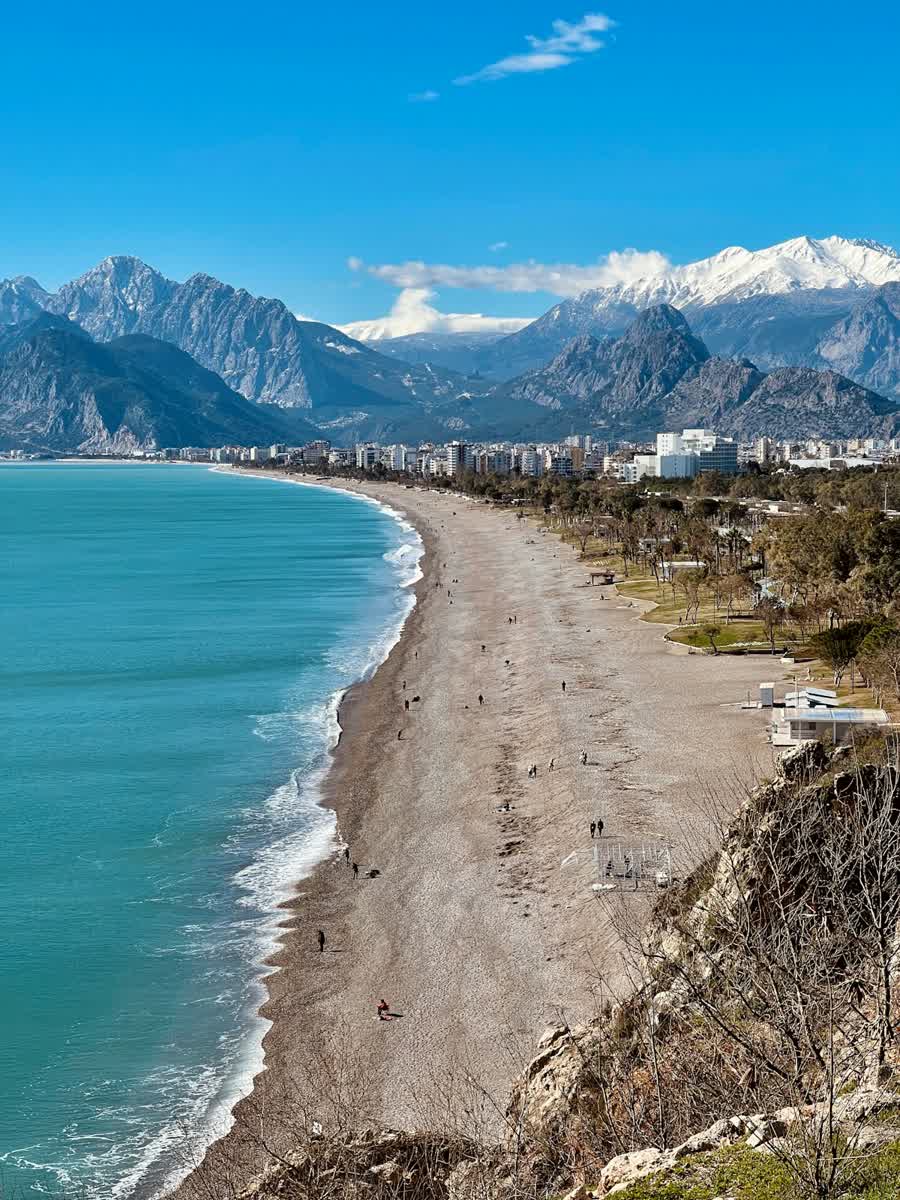 Konyaalti Beach in Antalya with snow-capped Taurus Mountains rising behind, Mediterranean Turkey