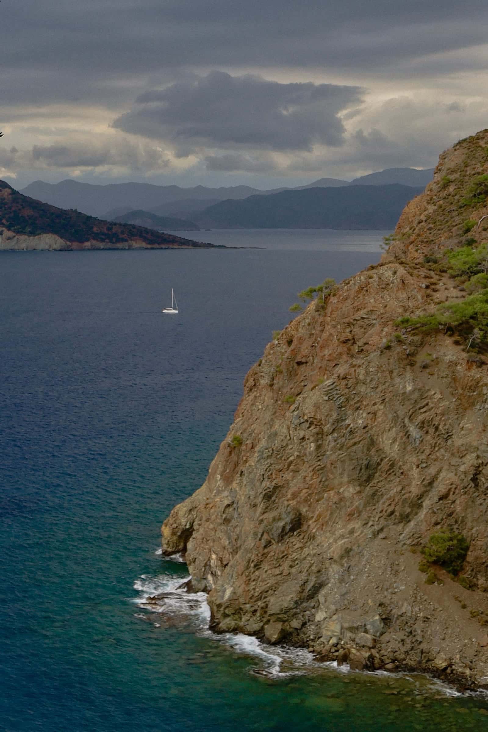 Ferry boat crossing turquoise Aegean Sea between Turkey and a Greek island