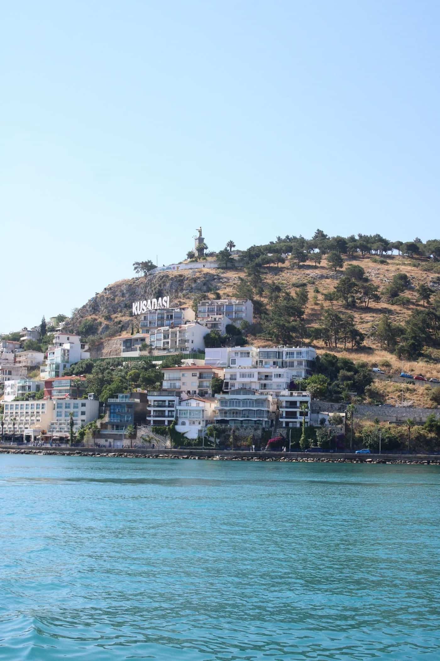 Kuşadası harbour with the Lady Bird Island (Güvercin Adası) causeway and Aegean sea view