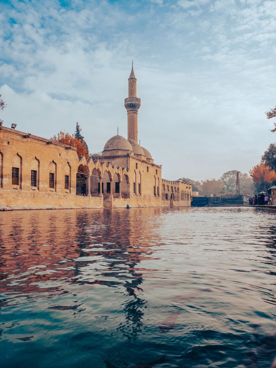 Rizvaniye Mosque mirrored in the water at Sanliurfa