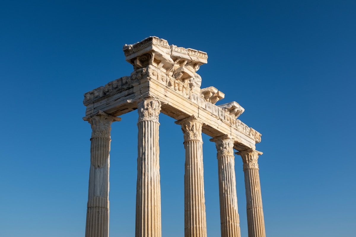 Ancient Roman temple columns against blue sky - Side, Manavgat, Antalya, Turkey